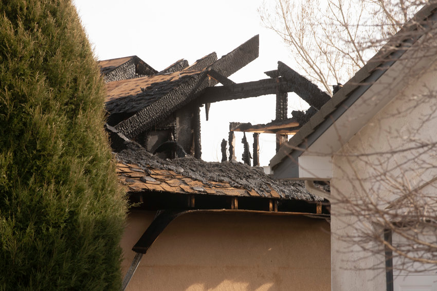 Neighbors describe a home fully engulfed in flames as firefighters arrived on the scene, saying flames were “leaping out of the highest point of the house.”